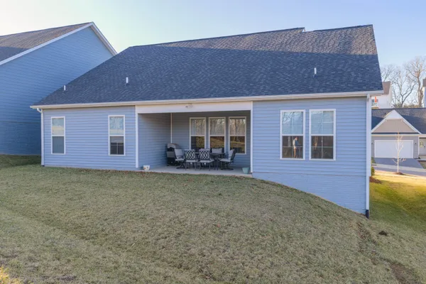 a house view with a garden space