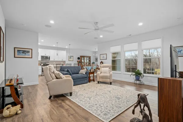 a living room with furniture and a table