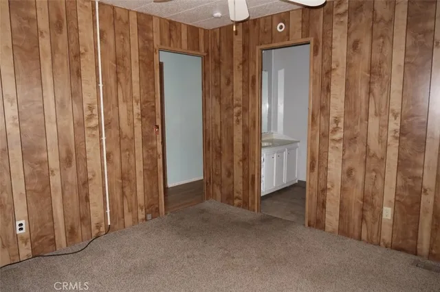a view of a hallway with closet area