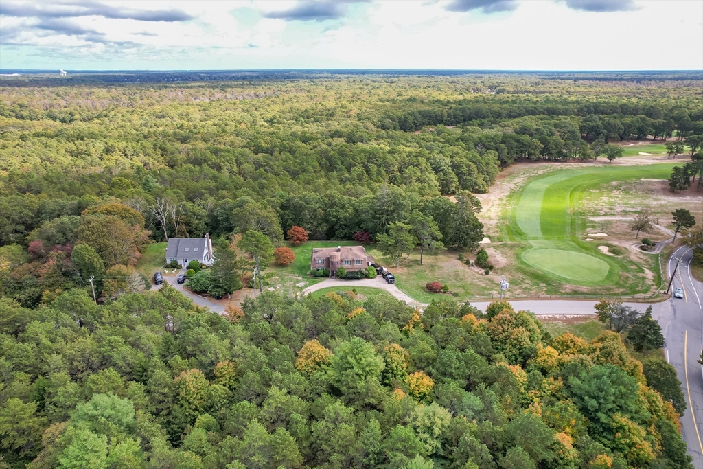 11 Ranch Road Falmouth, MA 02536 - Photo 2 of 8 an aerial view of residential houses with outdoor space and trees