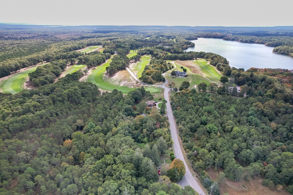 11 Ranch Road Falmouth, MA 02536 - Photo 3 of 8 an aerial view of residential houses with outdoor space
