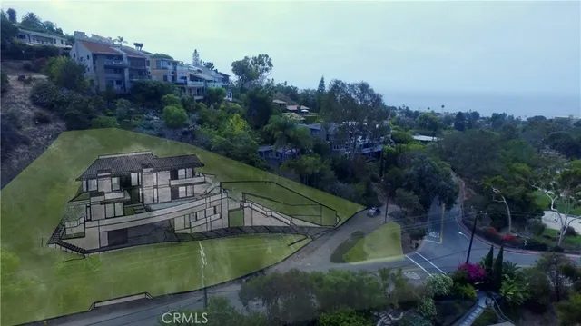 an aerial view of a house with a garden