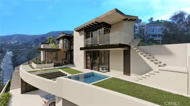 an aerial view of a house with a garden