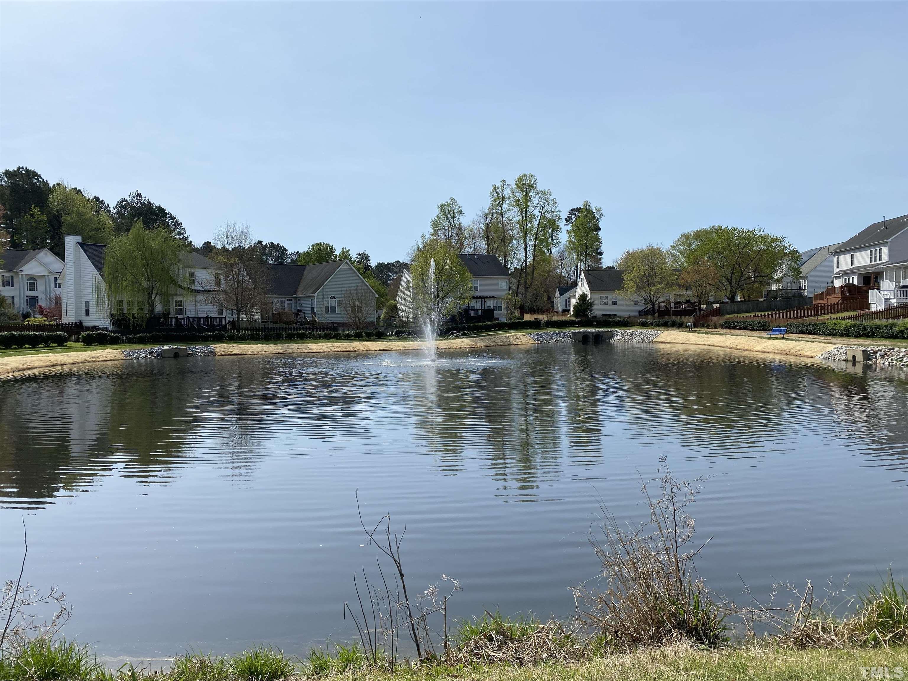 4401 Major Loring Way Raleigh, NC 27616 - Photo 3 of 20 a view of a lake with houses in the back