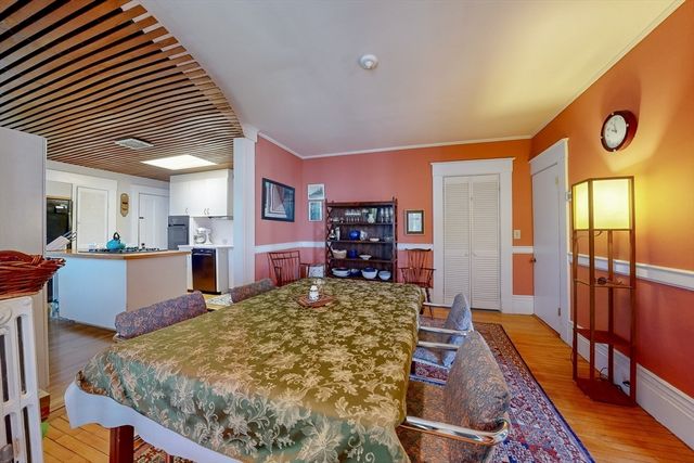 a bed room with furniture and window