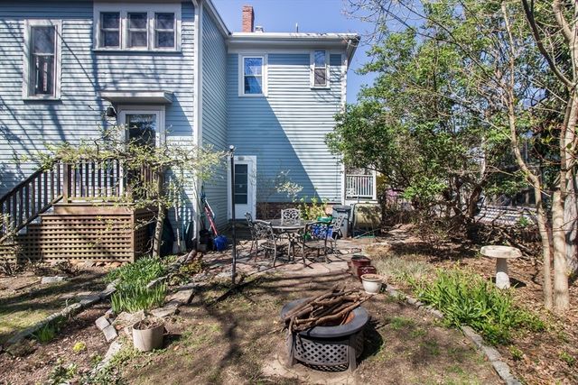 a car parked in front of a house