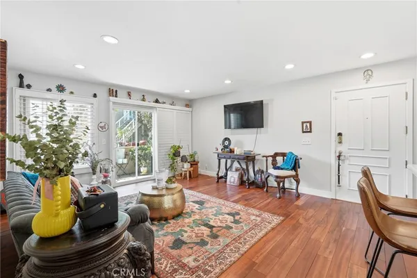a living room with furniture and a table