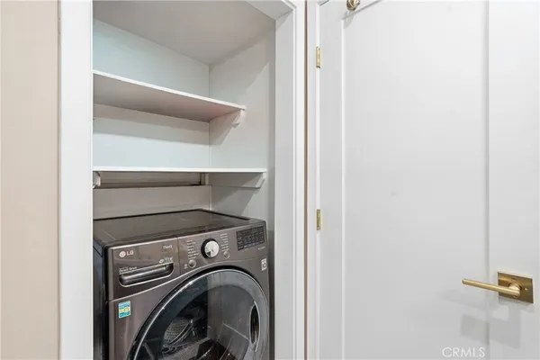 a view of washer and dryer in a utility room