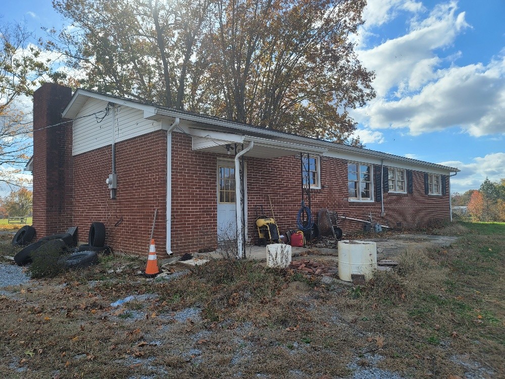 351 Powell Chapel Road Pulaski, TN 38478 - Photo 4 of 12 a view of a house with a yard