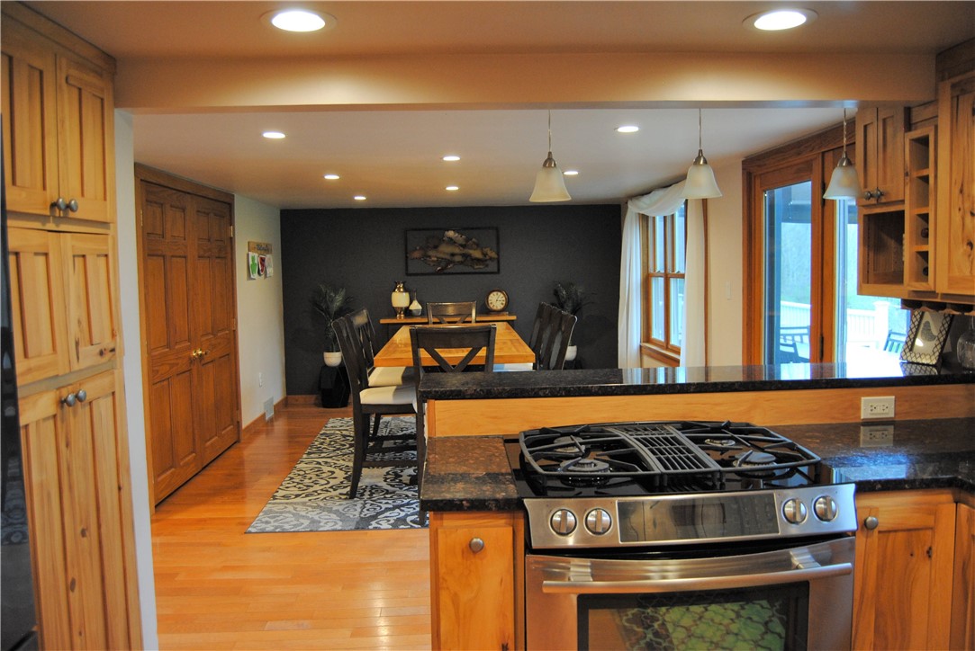 6786 Cayward Hill Road Prattsburgh, NY 14873 - Photo 12 of 42 kitchen view into dining room