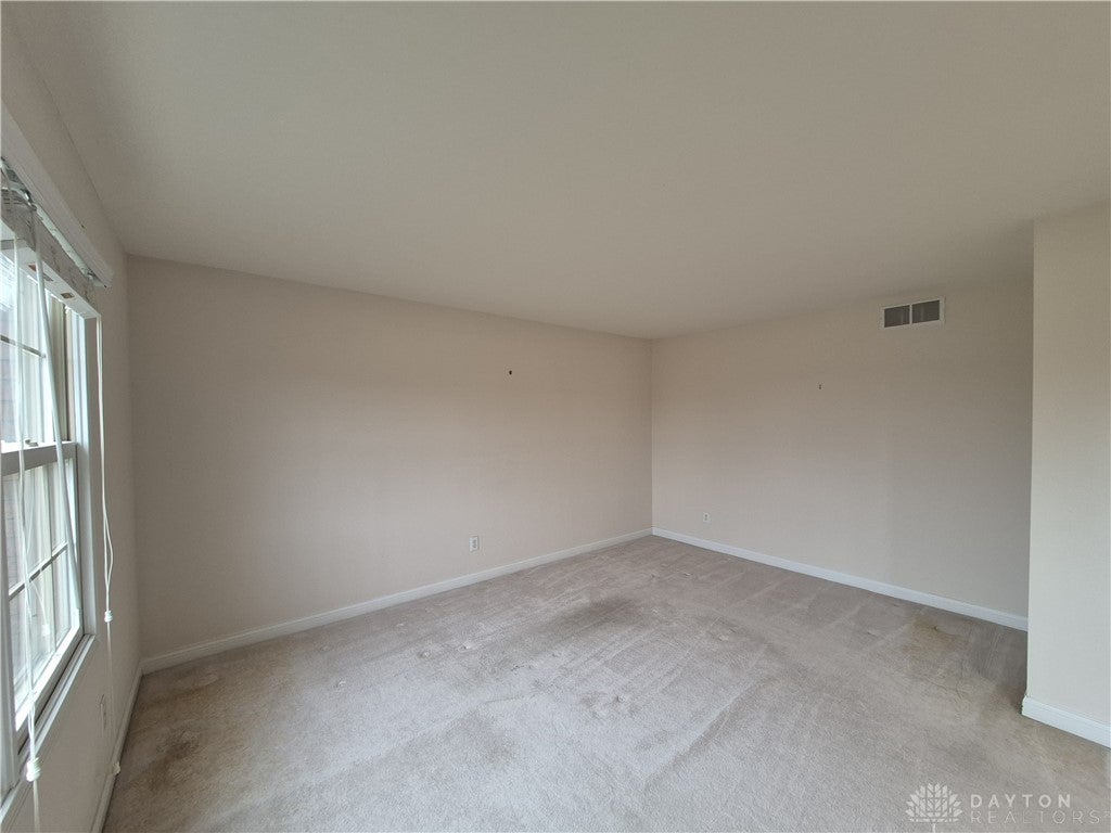 633 Orient Way Hamilton, OH 45013 - Photo 12 of 68 This airy living space offers ample light and comfortable carpeting, perfect for quiet enjoyment.