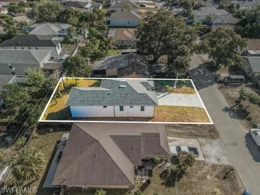 a kitchen with a refrigerator a sink and a stove