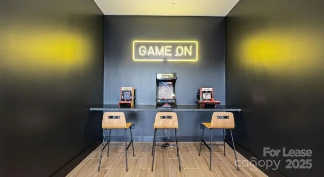 a view of a workspace with furniture