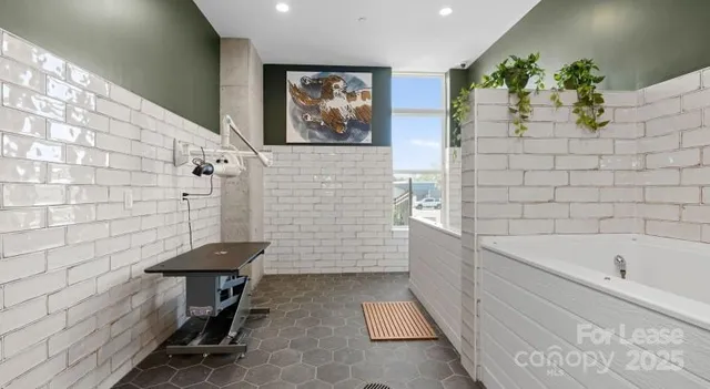 a bathroom with a bathtub and sink
