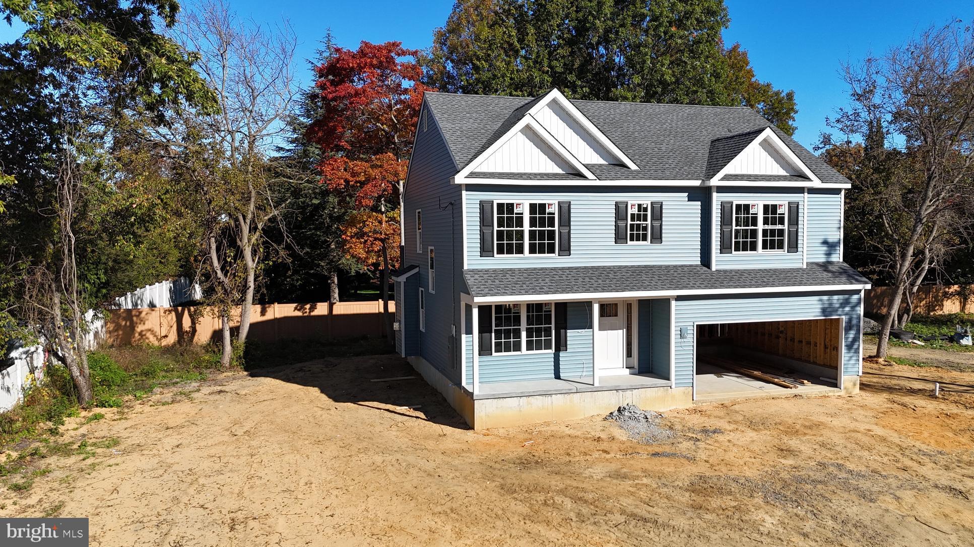 449 Prospect Avenue West Berlin, NJ 08091 - Photo 2 of 6 a front view of a house with a yard