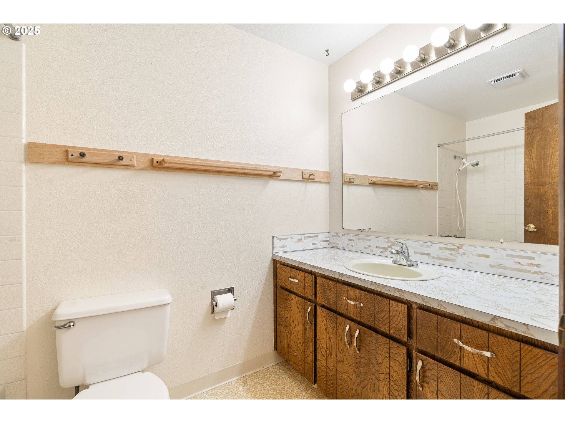 1246 Southeast Barnes Road Gresham, OR 97080 - Photo 19 of 43 a bathroom with a sink and mirror