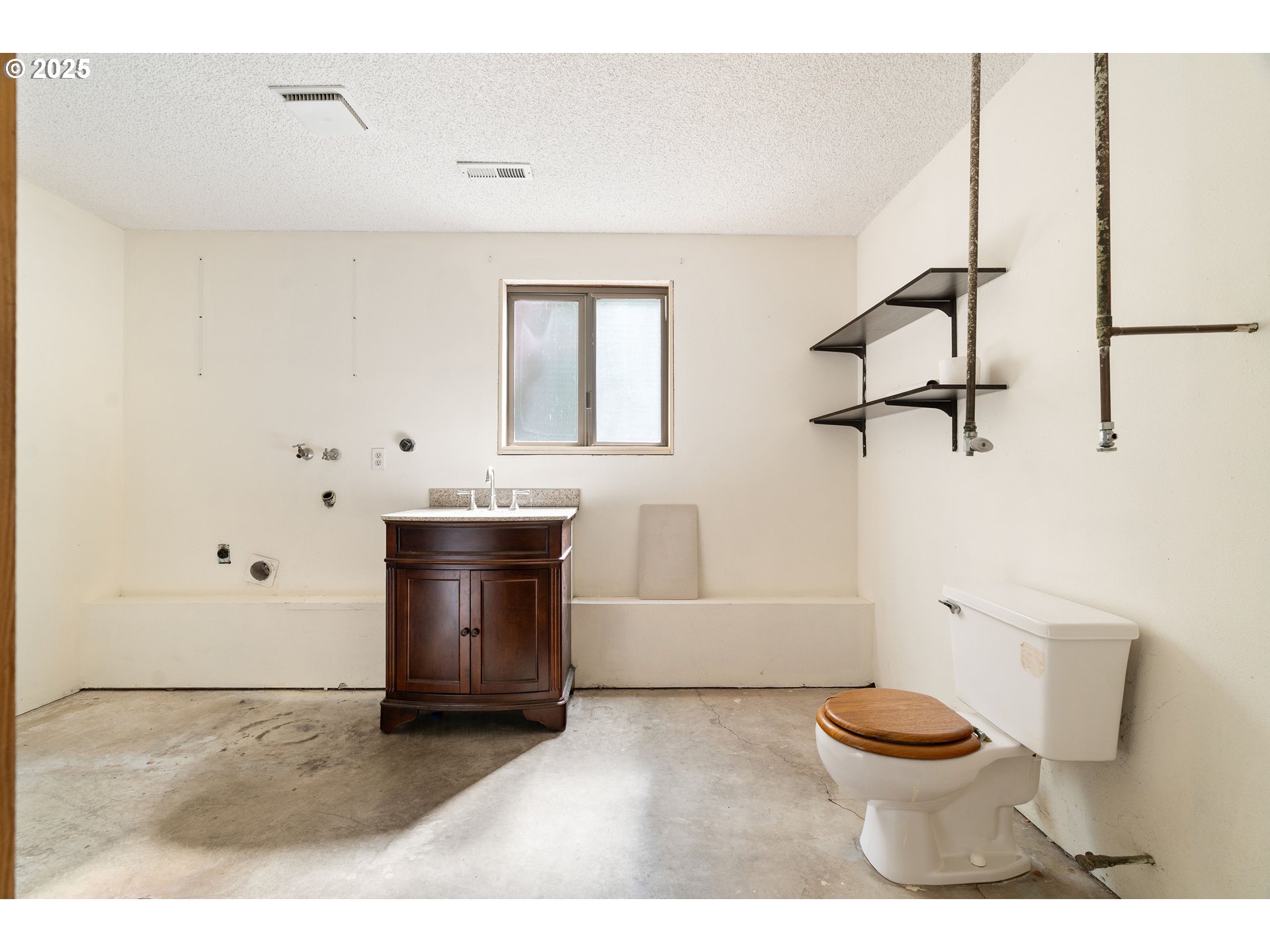 1246 Southeast Barnes Road Gresham, OR 97080 - Photo 33 of 43 a bathroom with a sink a toilet and shower