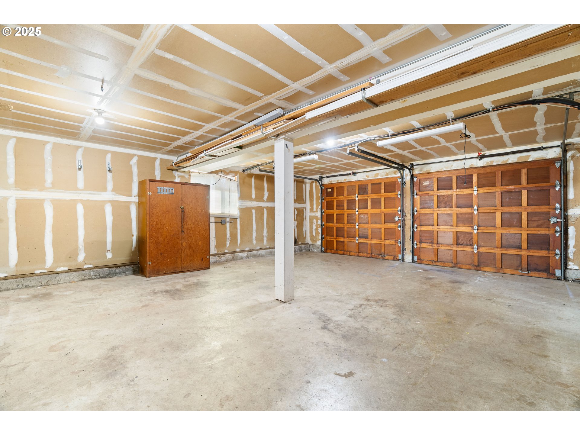 1246 Southeast Barnes Road Gresham, OR 97080 - Photo 35 of 43 a view of an empty room with a garage