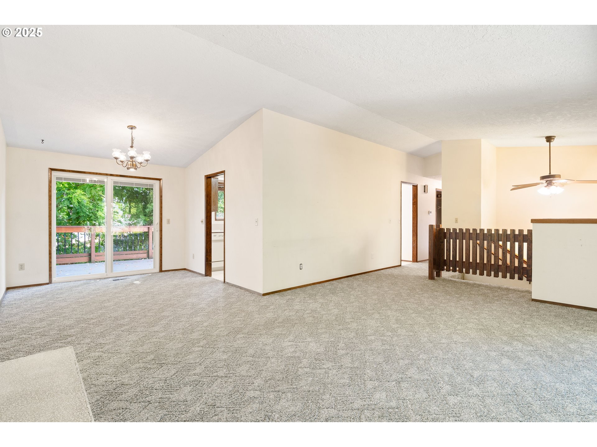 1246 Southeast Barnes Road Gresham, OR 97080 - Photo 8 of 43 a view of a livingroom with a staircase