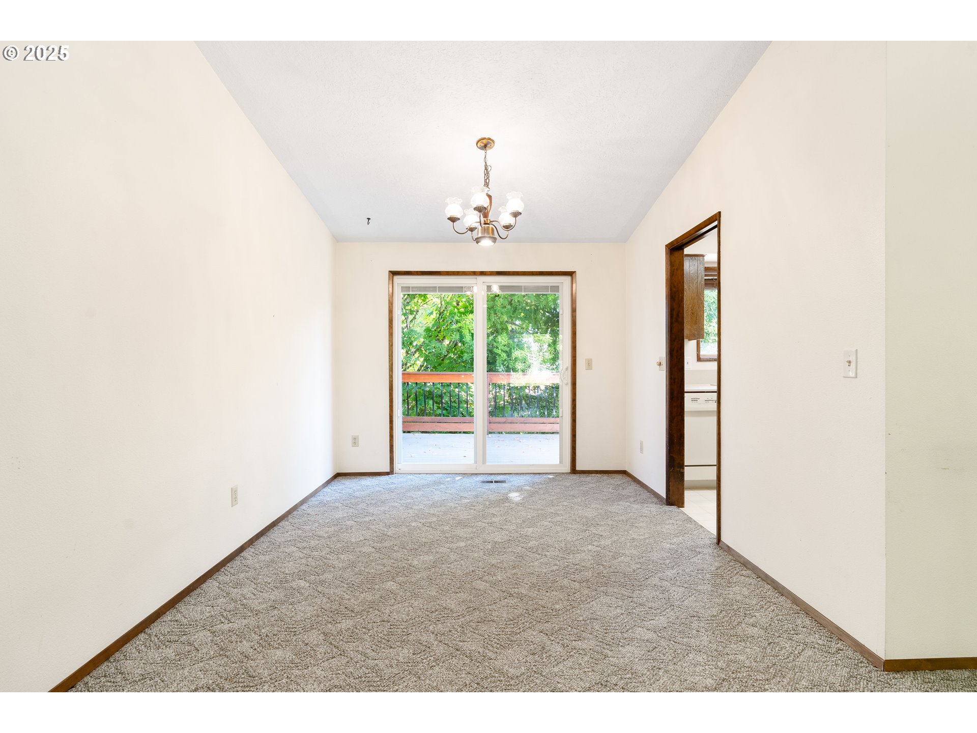 1246 Southeast Barnes Road Gresham, OR 97080 - Photo 9 of 43 a view of a room with a large window