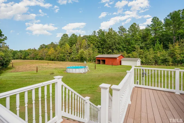 a view of a two chairs on the roof deck