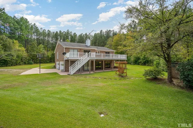 a view of a house with a big yard