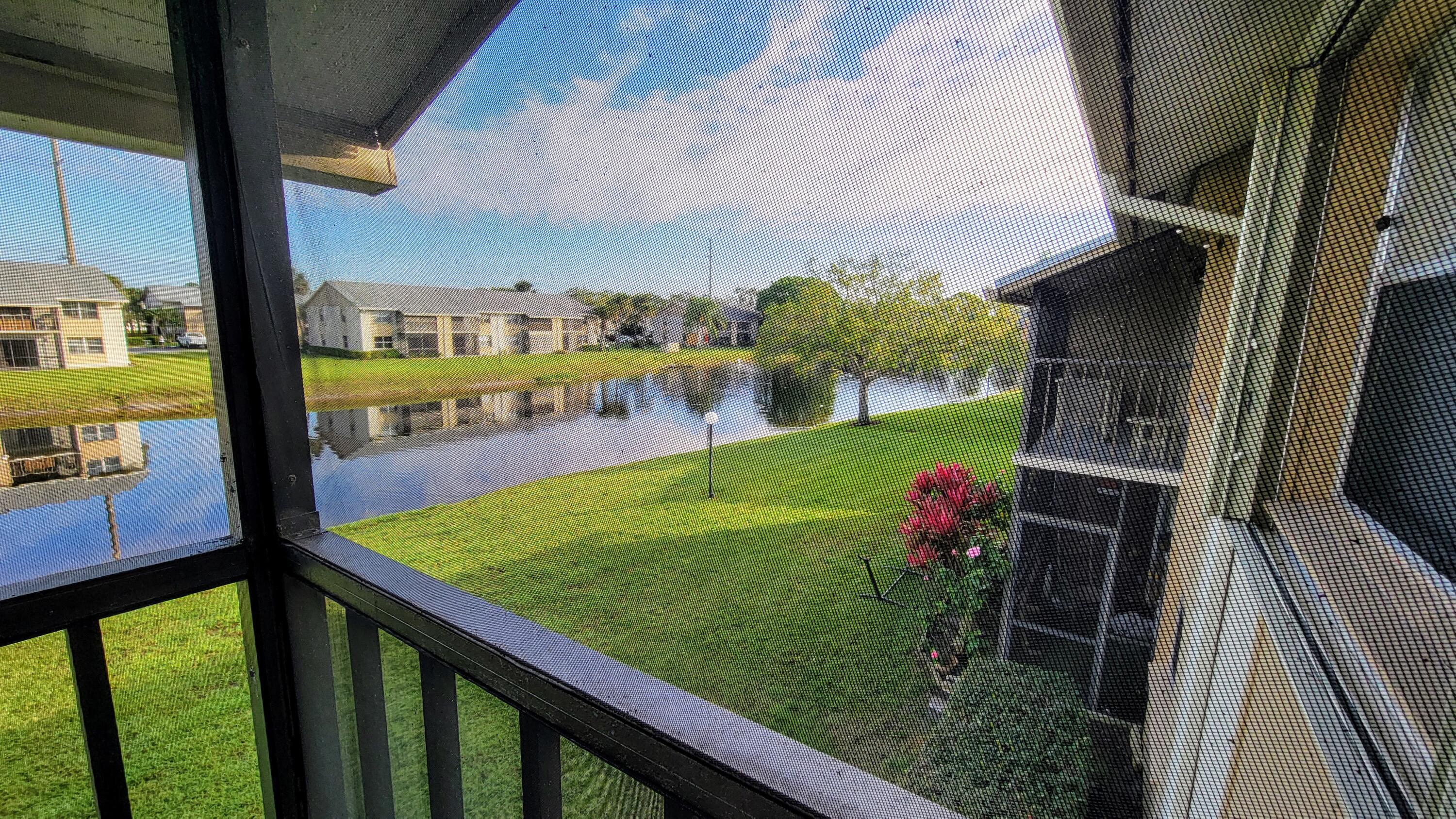 3105 Southeast Aster Lane, Unit 1806 Stuart, FL 34994 - Photo 29 of 45 a view of swimming pool from balcony