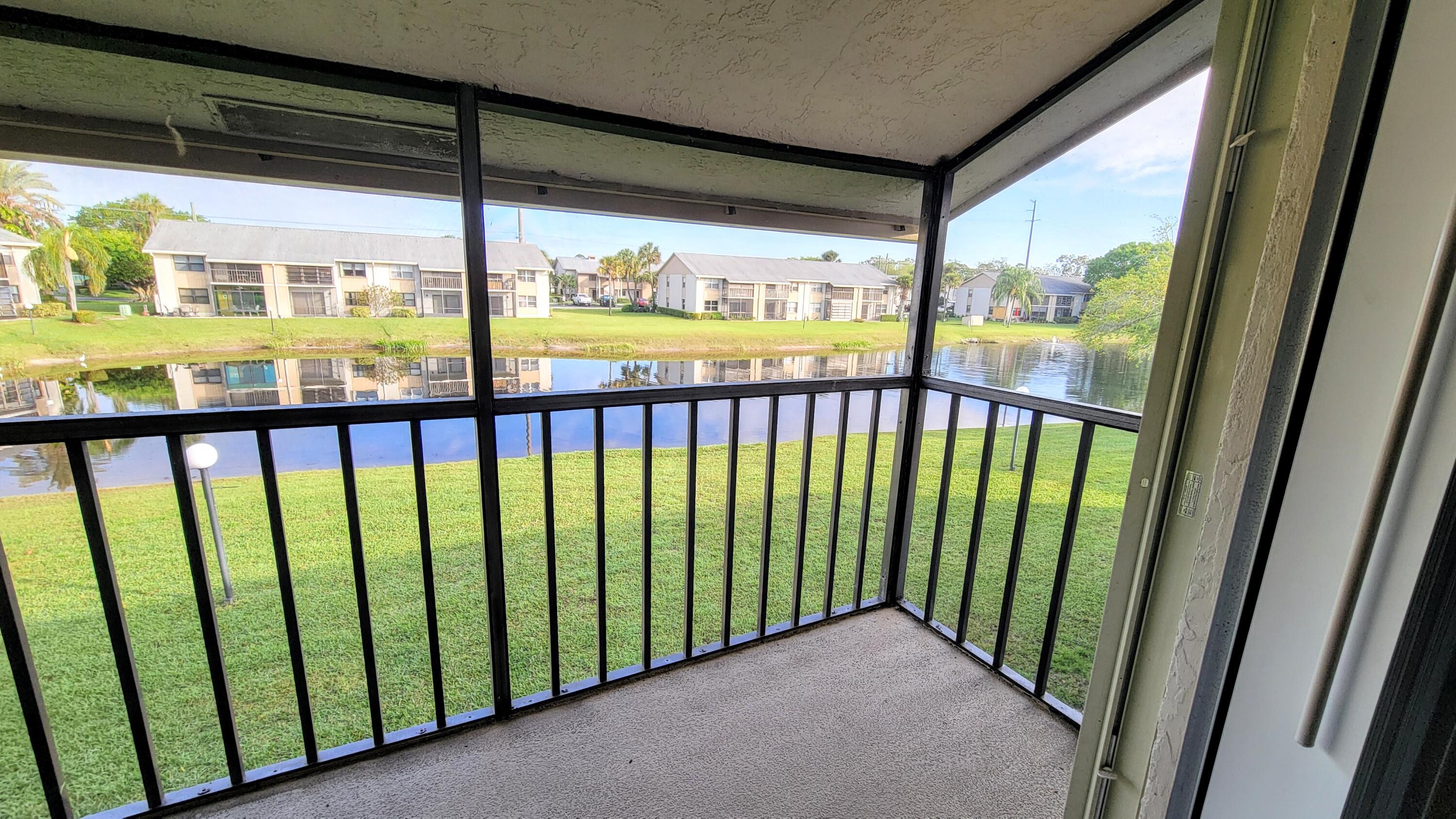 3105 Southeast Aster Lane, Unit 1806 Stuart, FL 34994 - Photo 30 of 45 a view of a porch