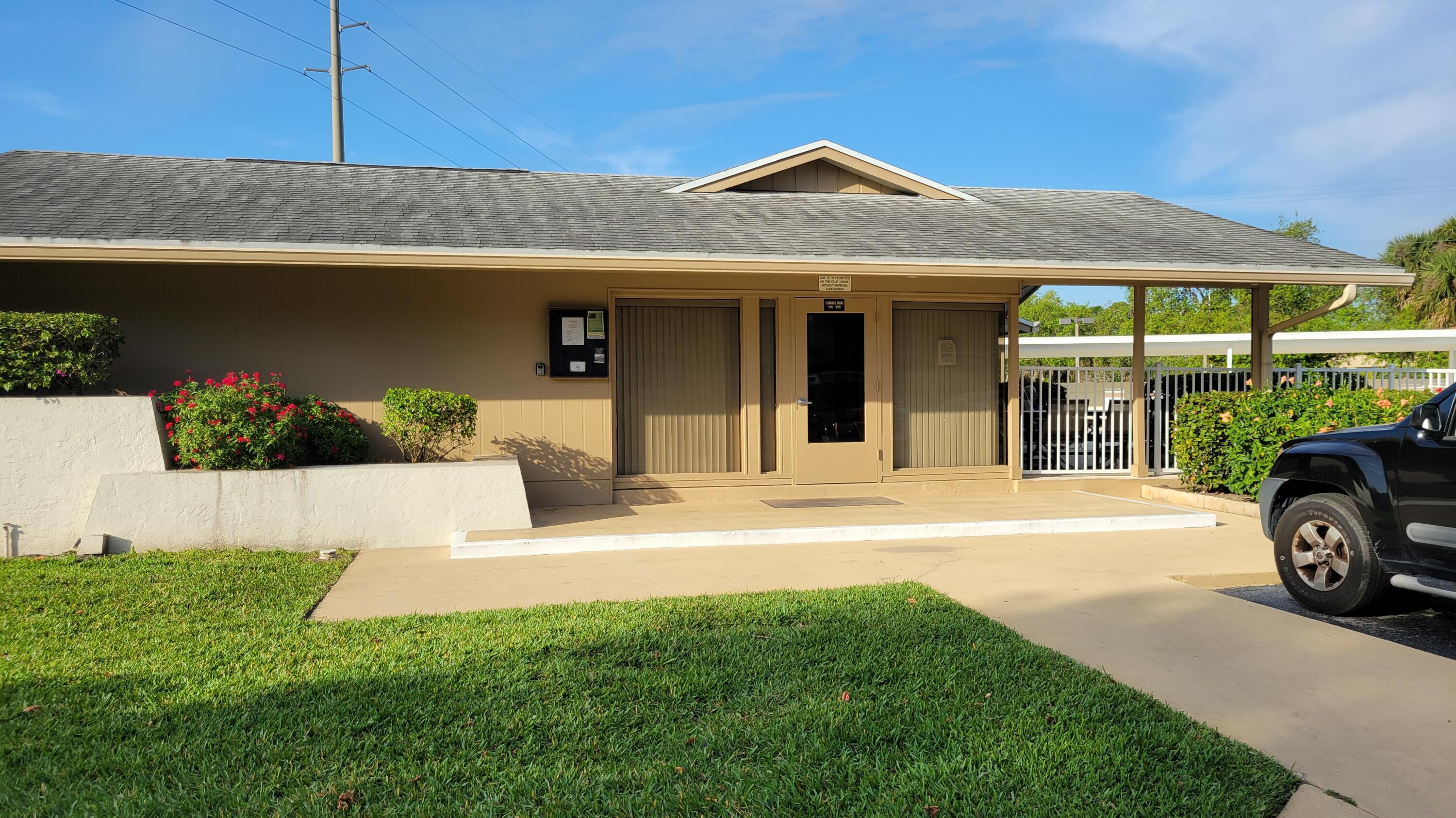 3105 Southeast Aster Lane, Unit 1806 Stuart, FL 34994 - Photo 36 of 45 a view of a house with a outdoor space