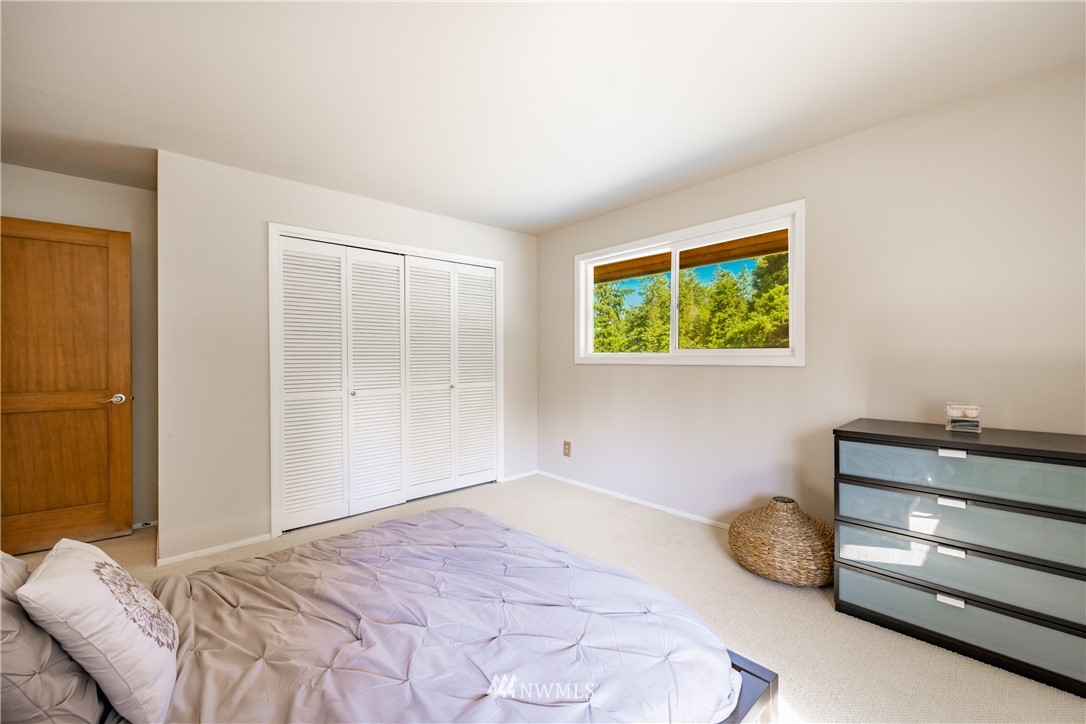8403 Kickerville Road Blaine, WA 98230 - Photo 20 of 40 a bedroom with a bed and a window