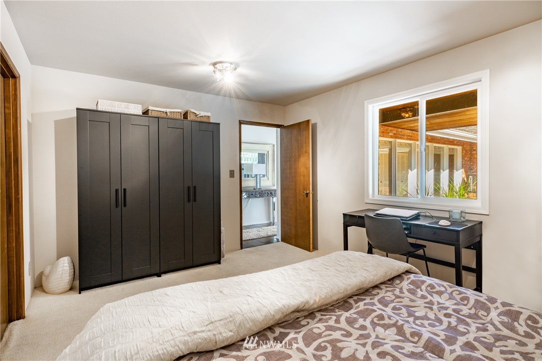 8403 Kickerville Road Blaine, WA 98230 - Photo 23 of 40 a bedroom with a bed and a window