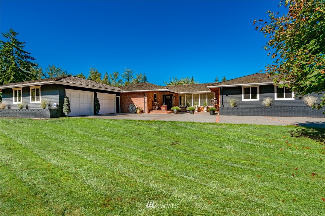 8403 Kickerville Road Blaine, WA 98230 - Photo 31 of 40 front view of a house with a yard