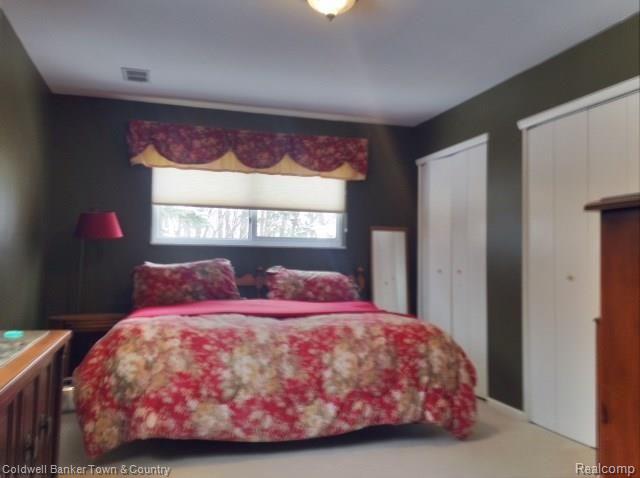 1800 Lone Tree Road Highland, MI 48357 - Photo 38 of 43 Master bedroom