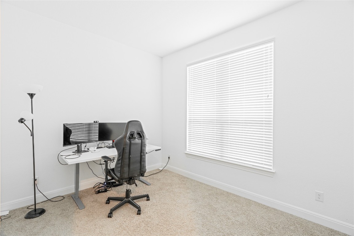 3037 Sage Ranch Drive Leander, TX 78641 - Photo 21 of 26 a view of a workspace with a window