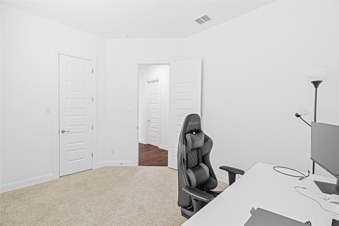 3037 Sage Ranch Drive Leander, TX 78641 - Photo 22 of 26 a view of a room with gym equipment