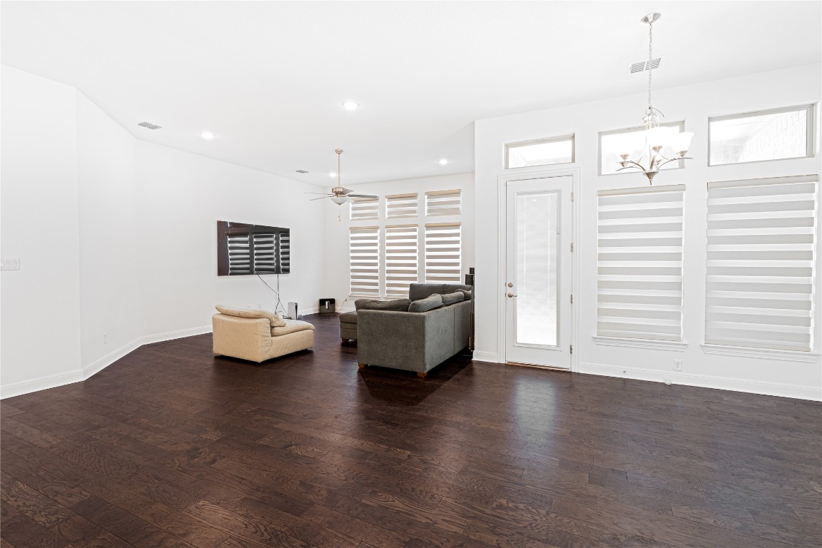 3037 Sage Ranch Drive Leander, TX 78641 - Photo 6 of 26 a living room with furniture and wooden floor