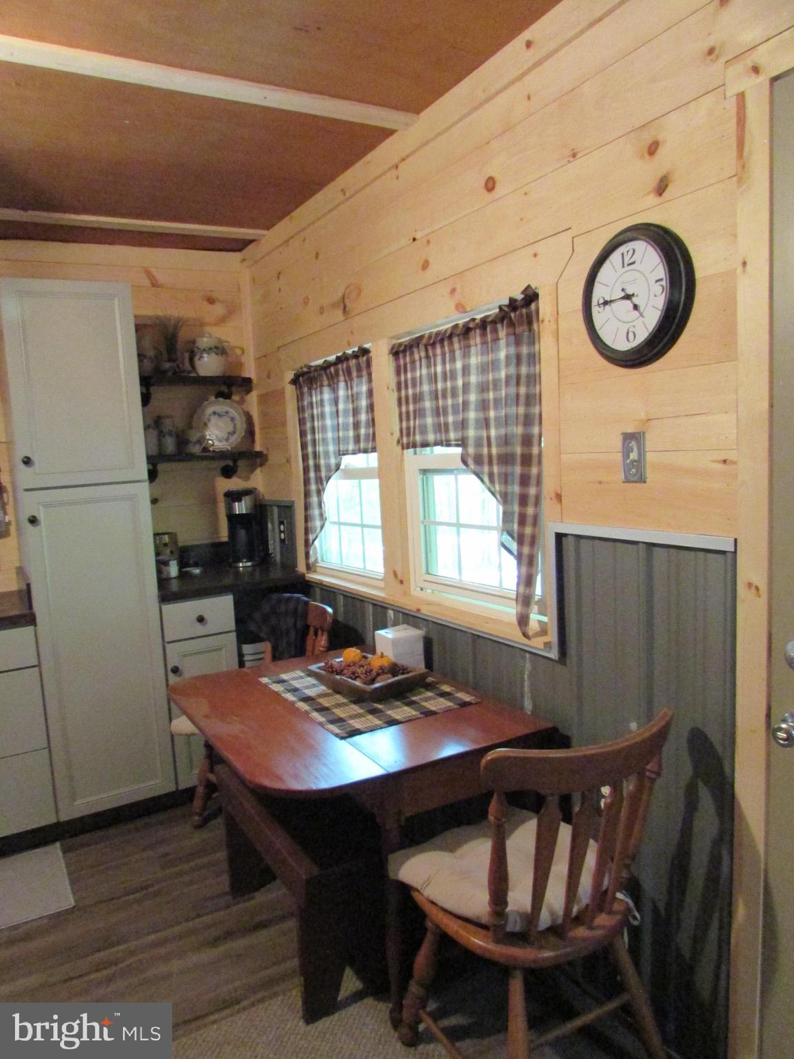 293 Snow Shoe Mountain Forest Road Snow Shoe, PA 16874 - Photo 11 of 38 a view of a dining room with furniture and window