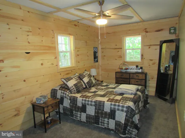 a room with a closet and a mirror