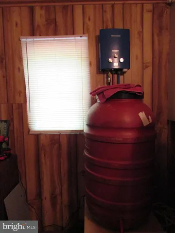 a bathroom with a shower and a sink