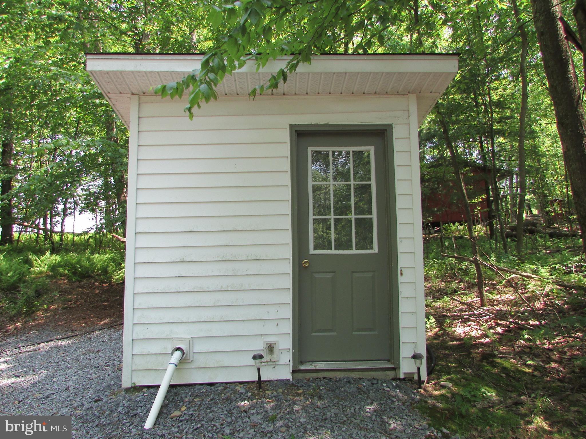 293 Snow Shoe Mountain Forest Road Snow Shoe, PA 16874 - Photo 28 of 38 a view of a house with a yard