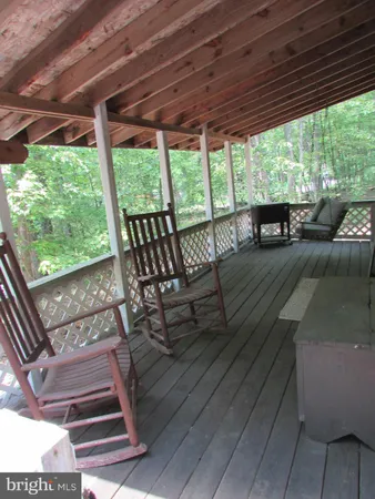 a view of porch with seating space