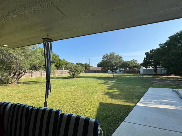 a view of a lake from a yard