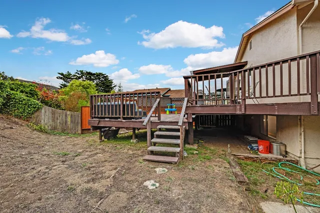 a view of a deck with a yard