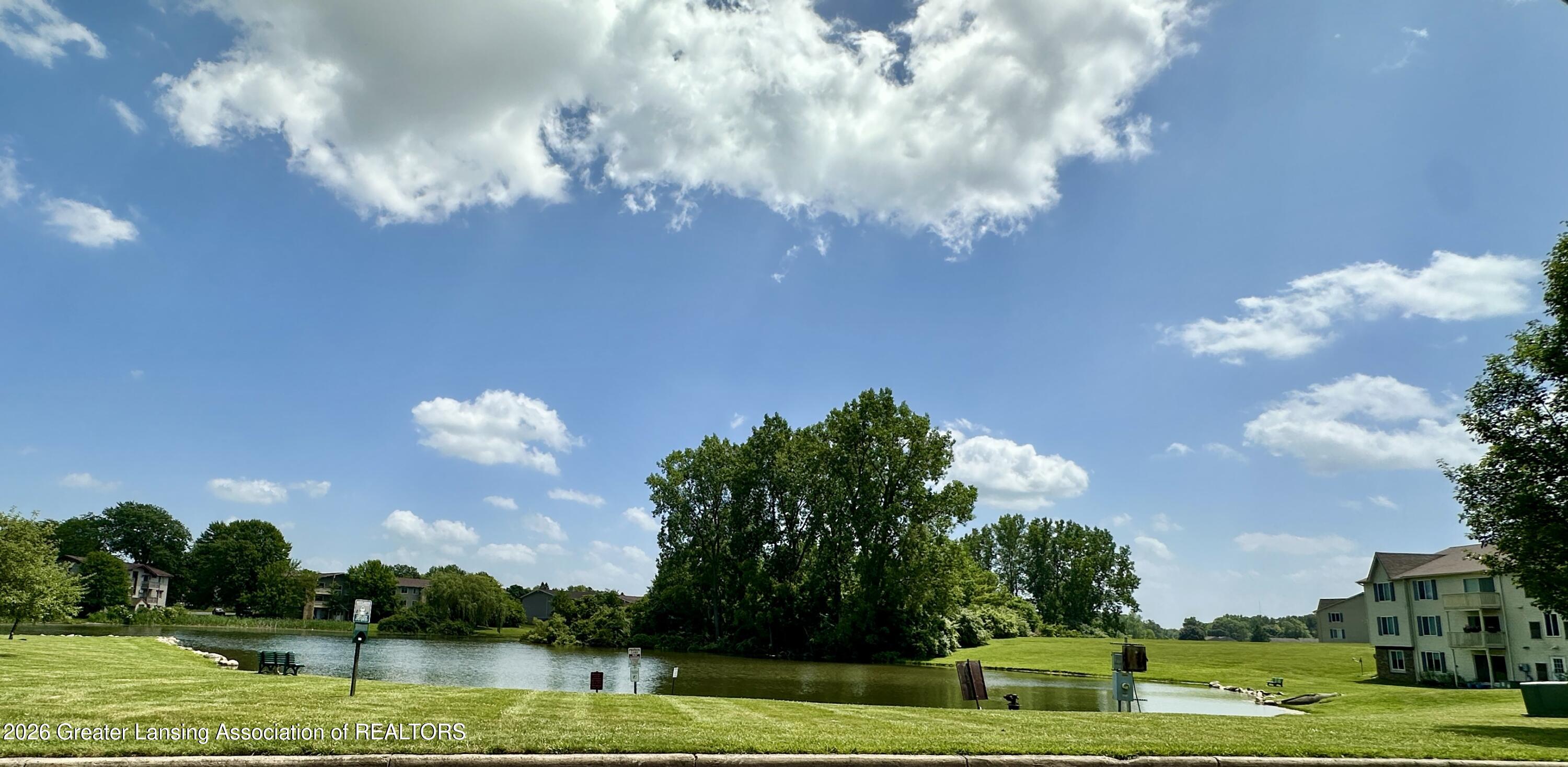 2059 La Mer Lane, Unit 17 Haslett, MI 48840 - Photo 44 of 48 Community Pond