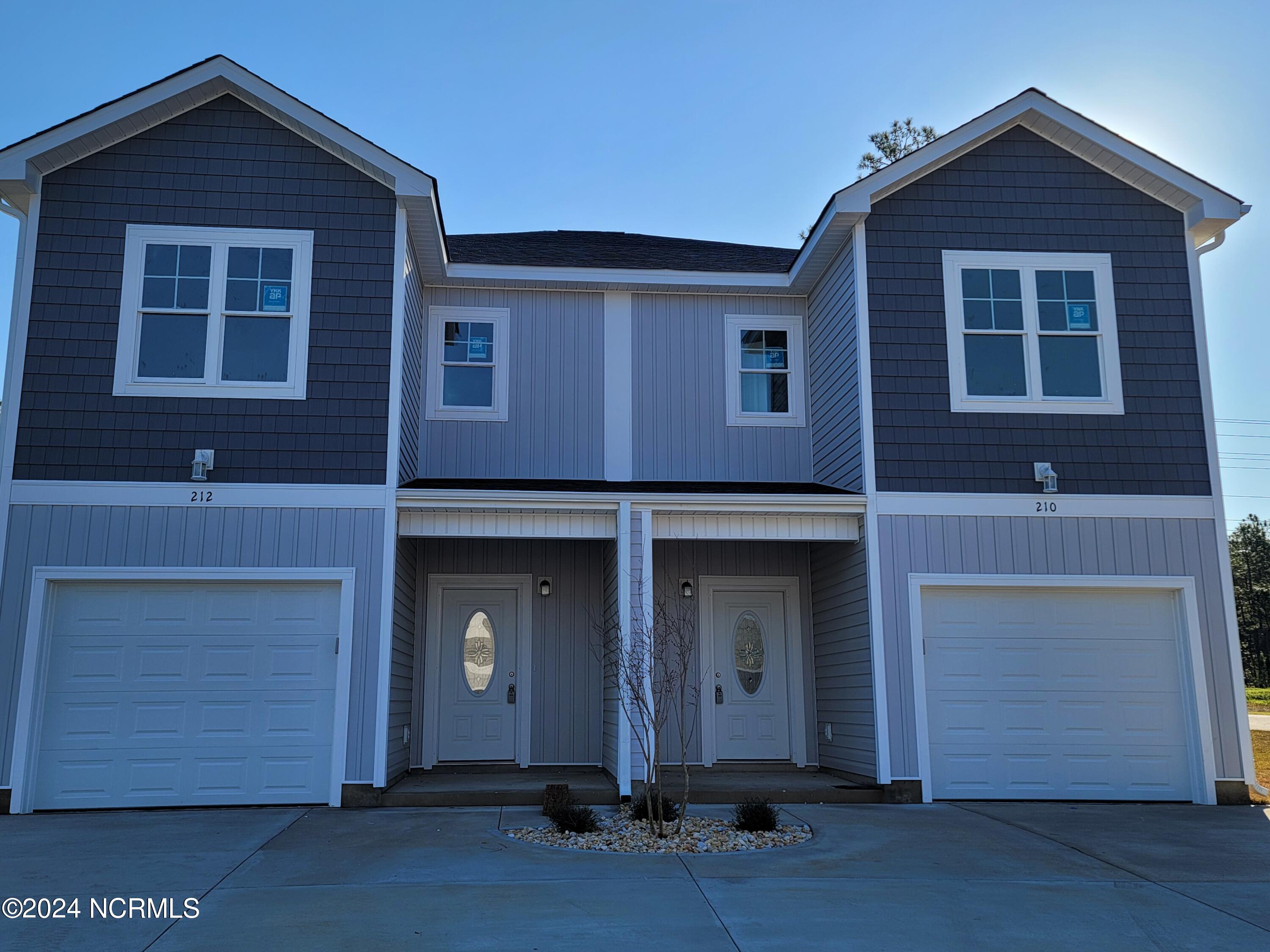 212 Holly Sands Loop Holly Ridge, NC 28445 - Photo 1 of 40 210 and 212 Holly Sands Loop