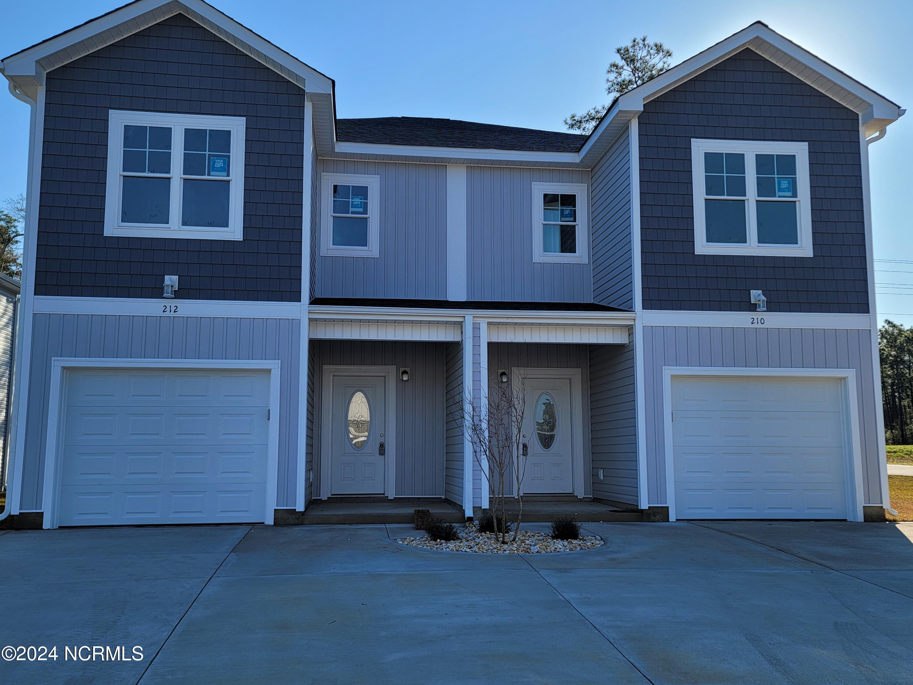 212 Holly Sands Loop Holly Ridge, NC 28445 - Photo 2 of 40 212 and 210 Holly Sands Loop