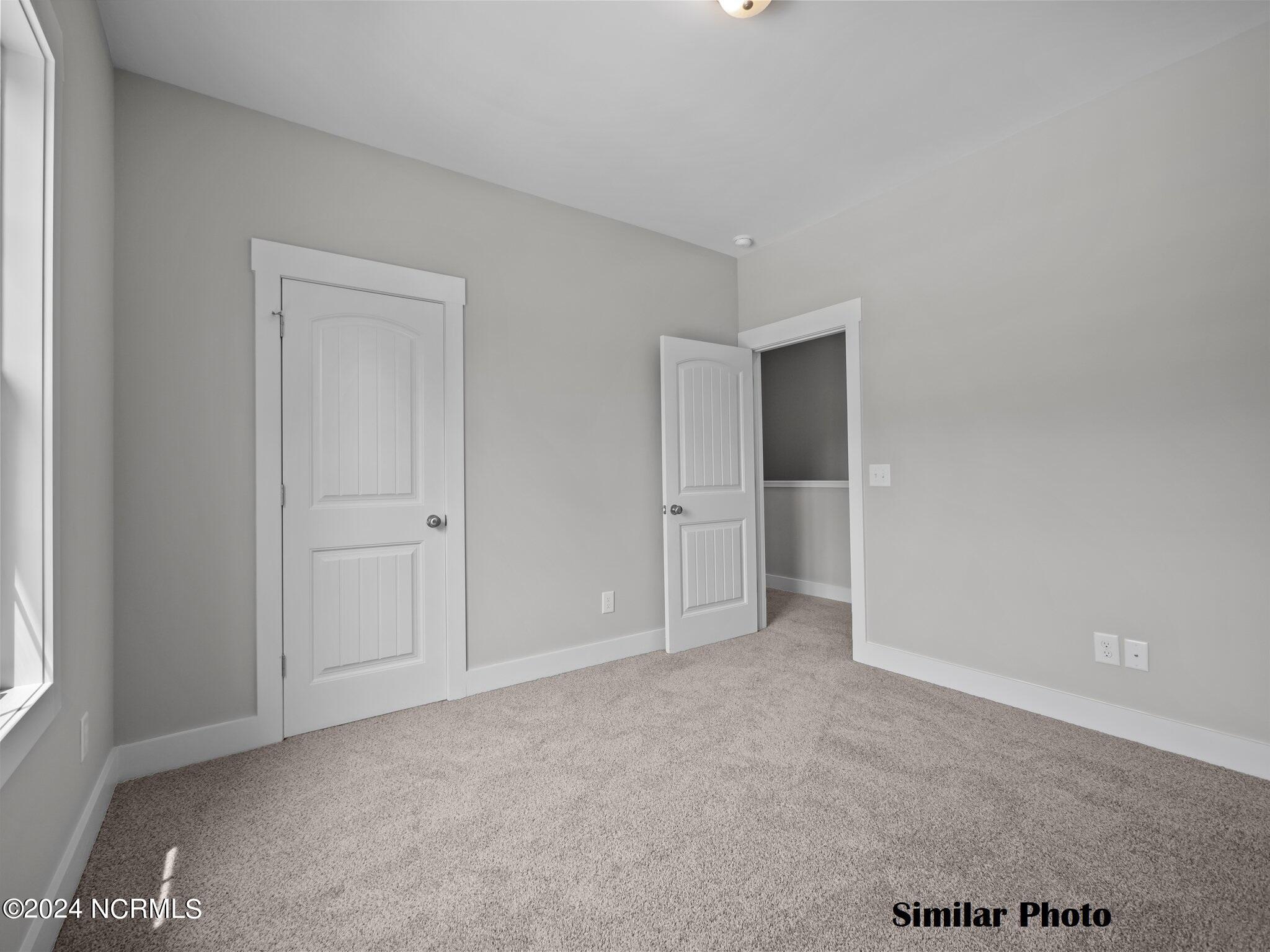212 Holly Sands Loop Holly Ridge, NC 28445 - Photo 20 of 40 Guest Bedroom 2