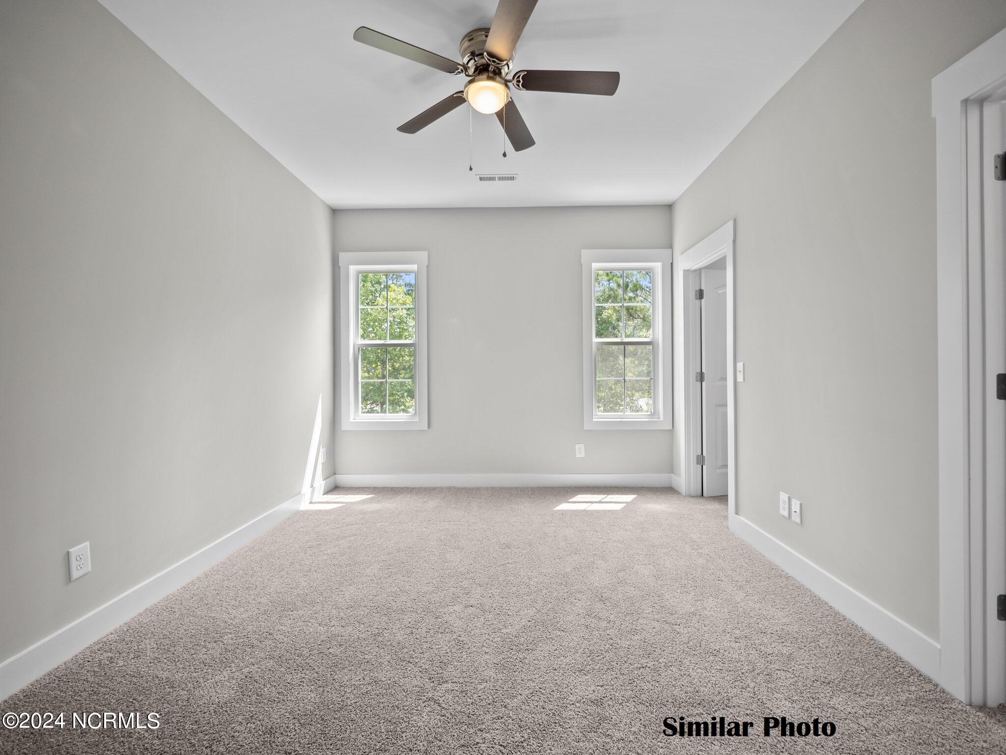 212 Holly Sands Loop Holly Ridge, NC 28445 - Photo 21 of 40 Primary bedroom