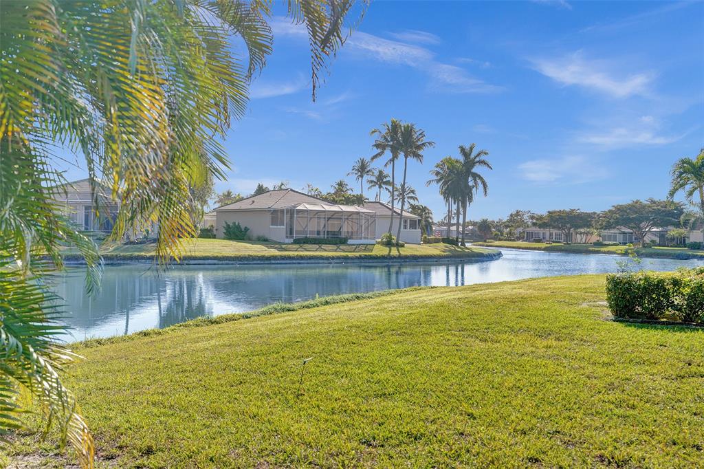 7992 Rockford Road Boynton Beach, FL 33472 - Photo 5 of 48 a view of a lake with houses in the backyard