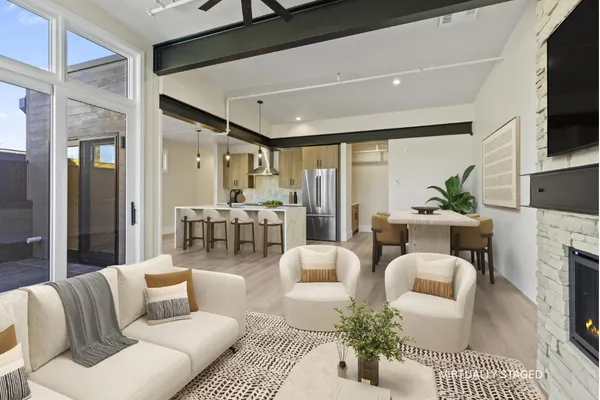 a living room with furniture or outdoor view and a fireplace